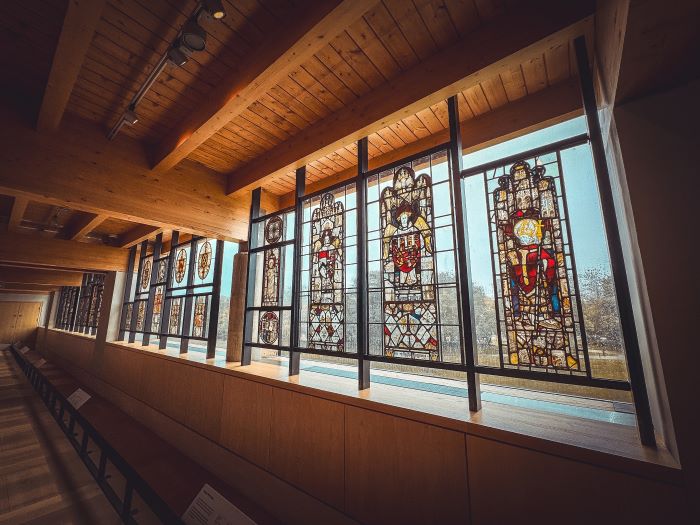 A row of stained-glass windows at The Burrell Collection