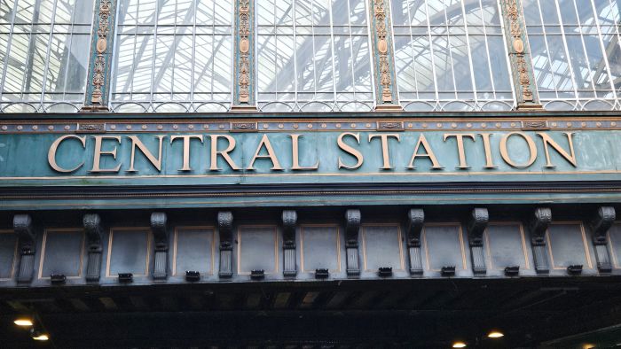 ‘Central Station’ sign in gold lettering at Glasgow Central station