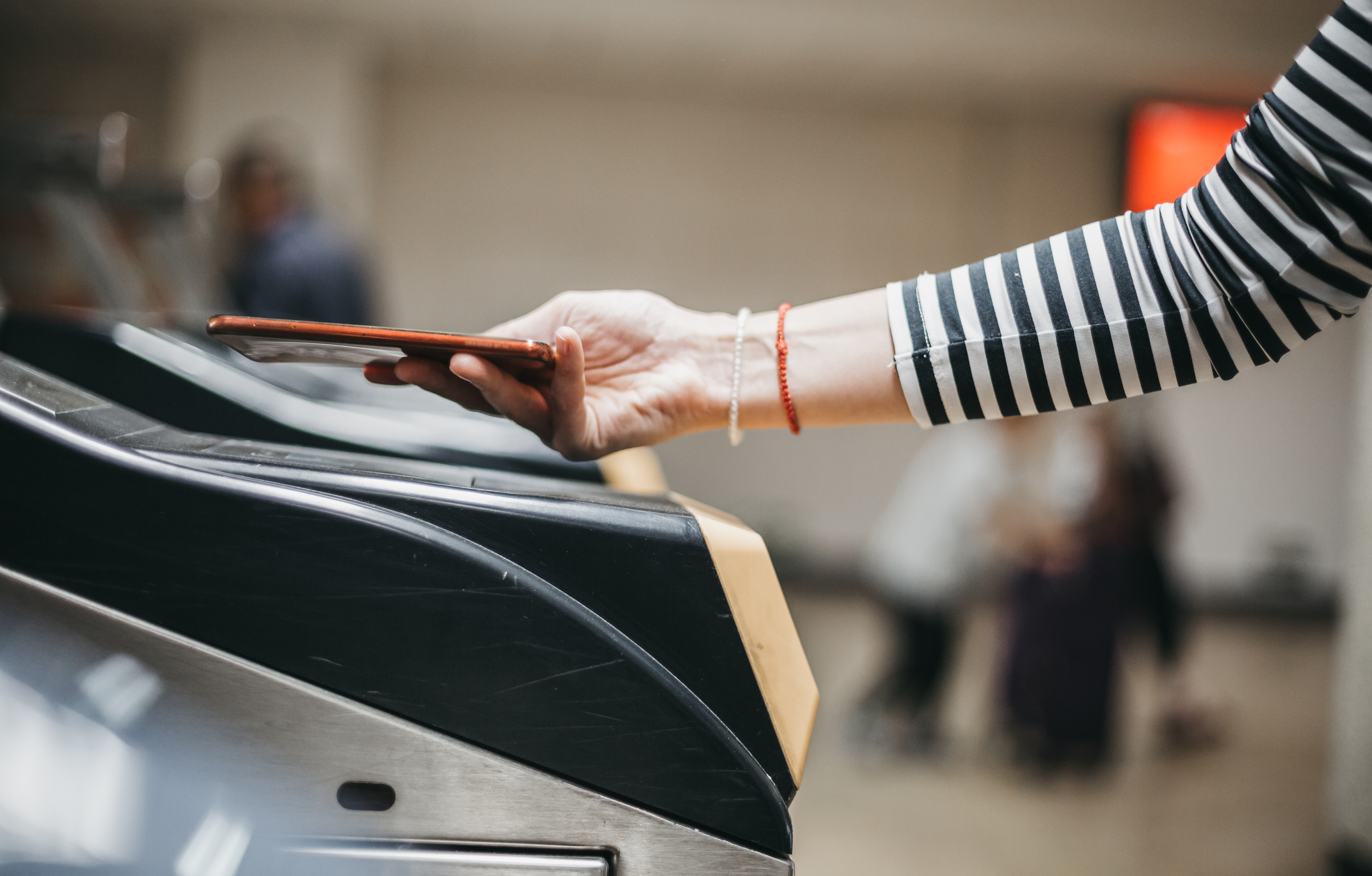 A women scanning an electronic ticket