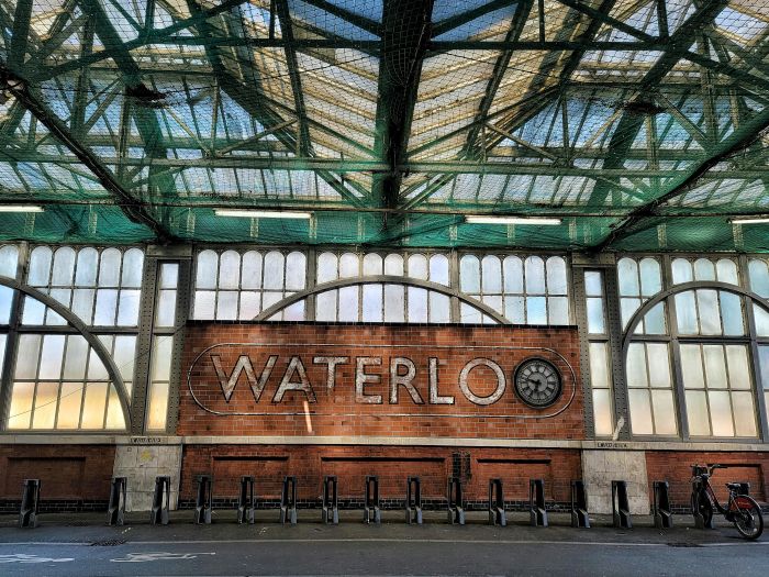 London Waterloo sign on a brick wall