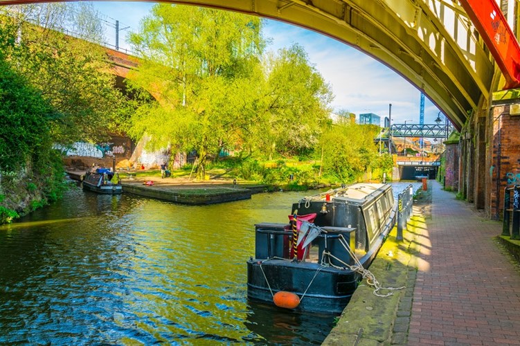 Boats sitting along Manchester canal
