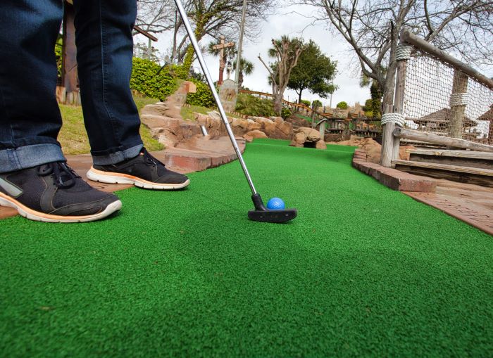 Person playing crazy golf
