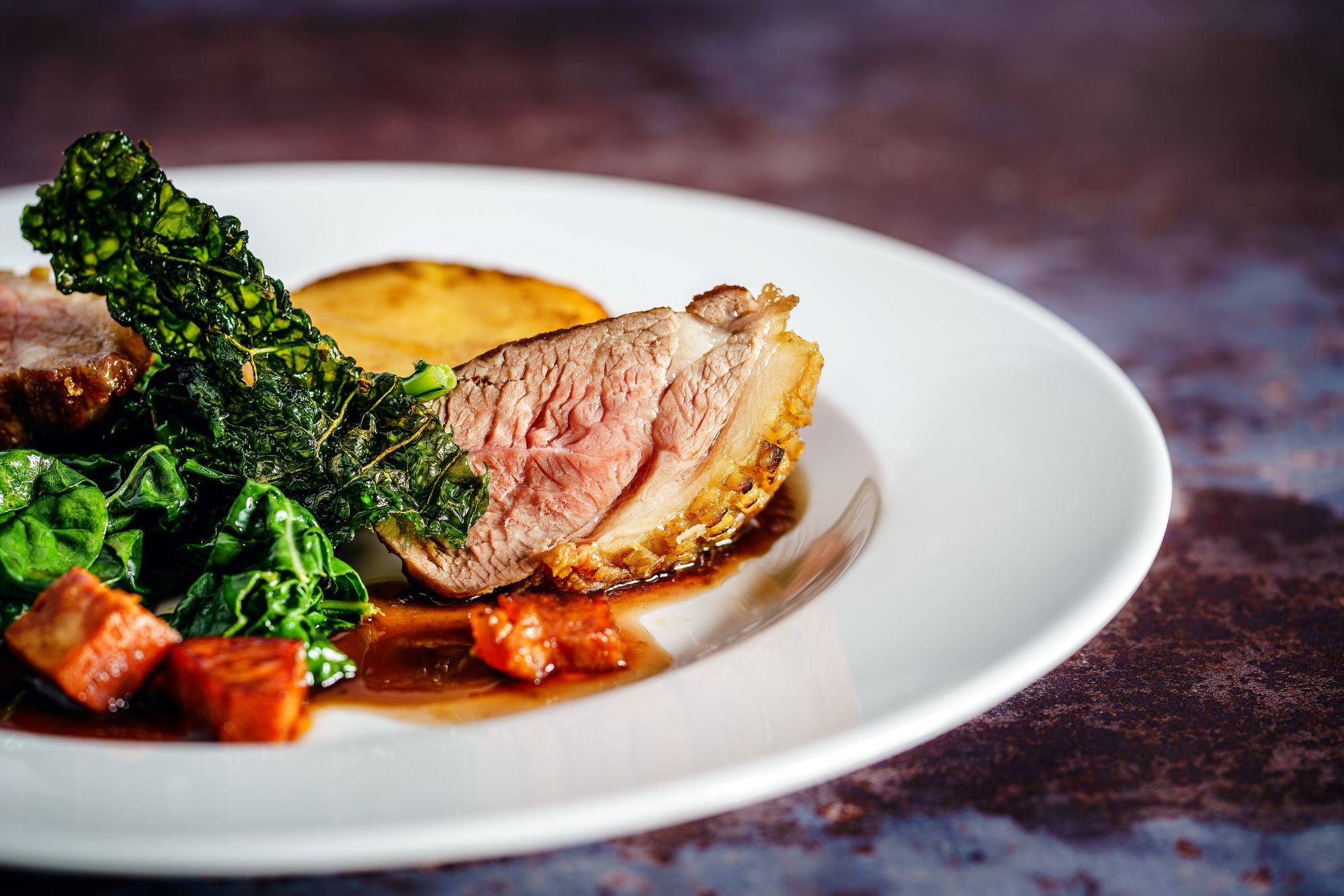 A roast dinner with vegetables and meat