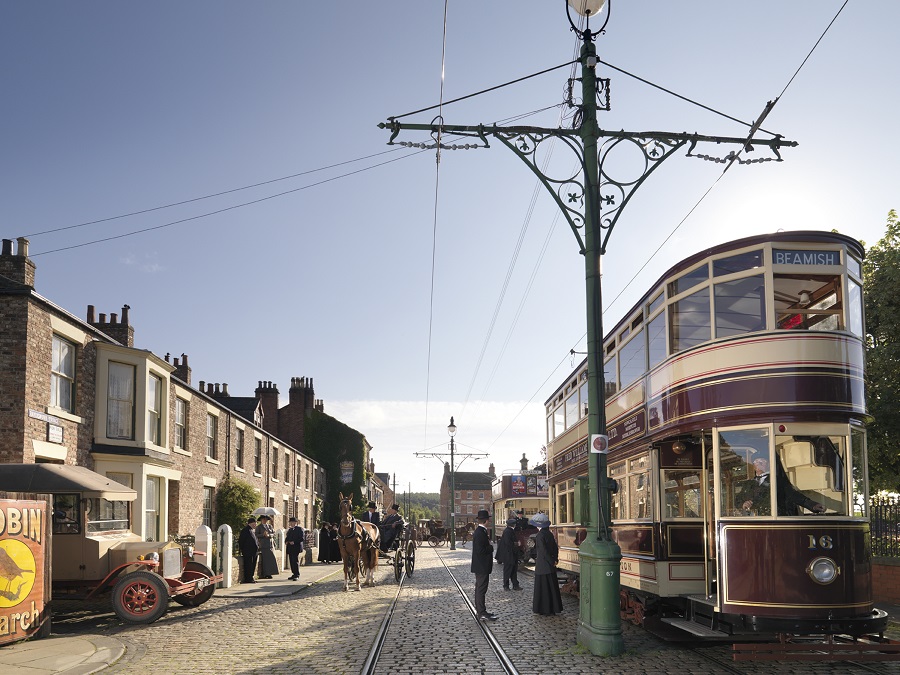 A group of people in Beamish about to board a tram